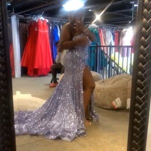 A sparkly icy blueish purple long slit dress